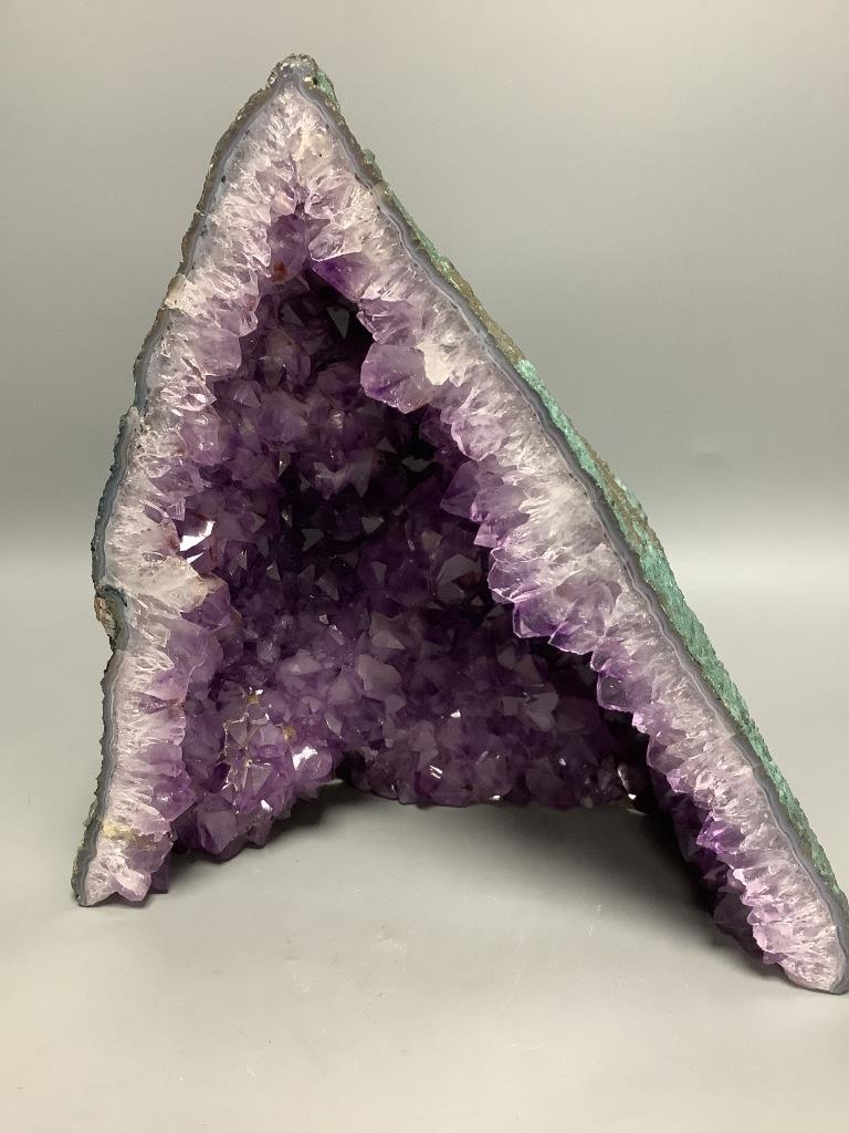 A large amethyst quartz geode, height 29.7cm.